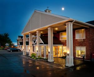 a building with a cross on top of it at Maritime Inn Port Hawkesbury in Port Hawkesbury