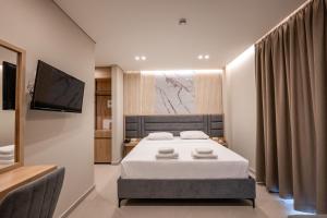 Postel nebo postele na pokoji v ubytování Koko Hotel