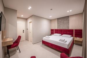Postel nebo postele na pokoji v ubytování Koko Hotel + 36 fotografií