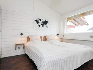 a bedroom with a large bed in a white room at 5 person holiday home in Aabenraa-By Traum in Aabenraa +34 photos