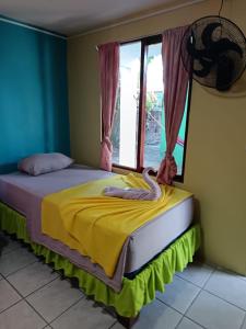 Postel nebo postele na pokoji v ubytování Cabinas Miss Miriam 2 + 5 fotografií