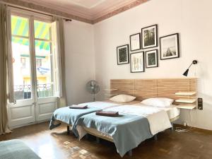 Posteľ alebo postele v izbe v ubytovaní Grand Central Apartment