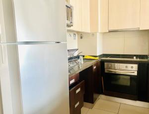 Una cocina o kitchenette en Moderno a pasos de Parque Arauco