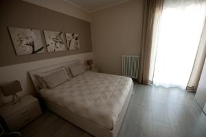 Posteľ alebo postele v izbe v ubytovaní Riva Dei Sassi