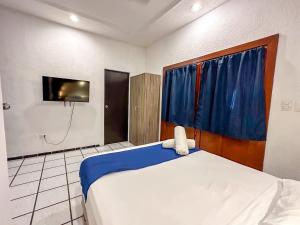 Postel nebo postele na pokoji v ubytování Loft para dos MaiT