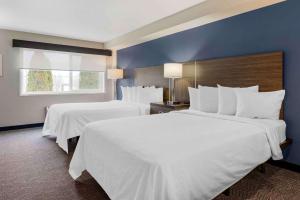 Postel nebo postele na pokoji v ubytování Extended Stay America Premier Suites - Portland - North