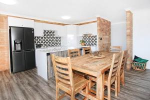 Köök või kööginurk majutusasutuses Illawong Apartment 7