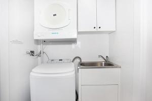 Köök või kööginurk majutusasutuses Illawong Apartment 7