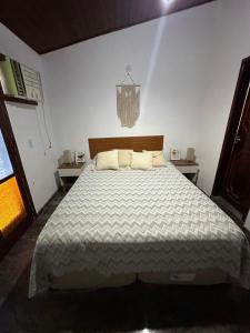 Ένα ή περισσότερα κρεβάτια σε δωμάτιο στο Rjjturismo