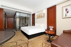 深圳国际会展中心凯嘉酒店-Shenzhen Kaijia Hotel-Shenzhen-World客房内的一张或多张床位