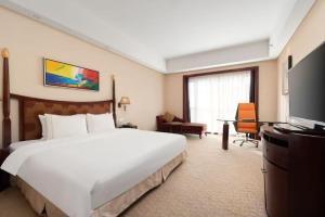 深圳国际会展中心凯嘉酒店-Shenzhen Kaijia Hotel-Shenzhen-World客房内的一张或多张床位