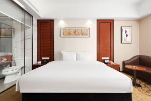 深圳国际会展中心凯嘉酒店-Shenzhen Kaijia Hotel-Shenzhen-World客房内的一张或多张床位