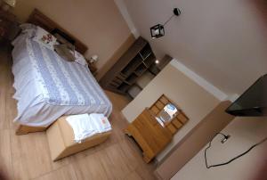 an overhead view of a bedroom with a bed at Giovi's house in Ilo