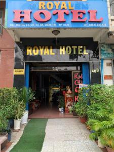 a royal hotel with a sign on the front of it at royal hotel bà điểm hồ chi minh in Ho Chi Minh City