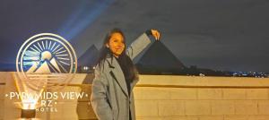Gosti u objektu Pyramids View R Z Hotel