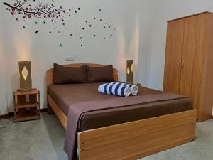 Letto o letti in una camera di Shell Abay