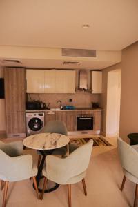 Kuchyň nebo kuchyňský kout v ubytování Mangroovy apartament El gouna