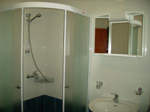 Kúpeľňa v ubytovaní Apartments Kalac + 16 fotografií
