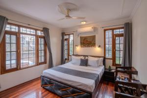Ένα ή περισσότερα κρεβάτια σε δωμάτιο στο SaffronStays Sun Villa