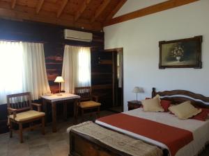 Ένα ή περισσότερα κρεβάτια σε δωμάτιο στο Complejo Tierra Mia