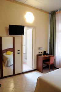 TV a/nebo společenská místnost v ubytování Hotel Button