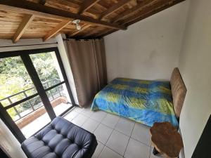 Postel nebo postele na pokoji v ubytování Aparta estudio campestre