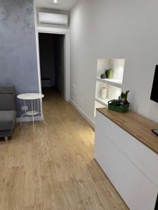 Η κουζίνα ή μικρή κουζίνα στο Ai Marinai LEVANTE Apartment