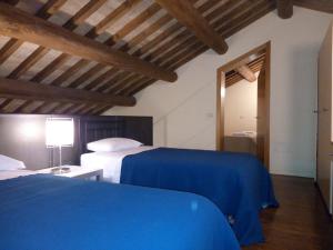 Posteľ alebo postele v izbe v ubytovaní Agriturismo Valdappio