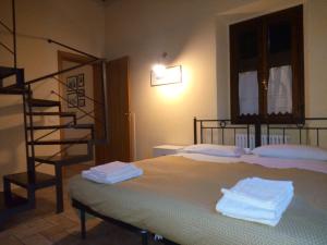 Posteľ alebo postele v izbe v ubytovaní Agriturismo Valdappio
