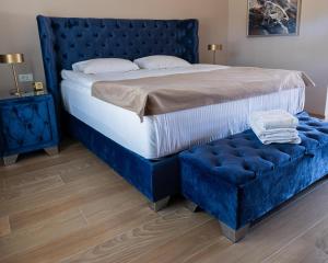 En eller flere senge i et værelse på Black Sea Horses