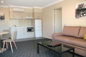 Una cocina o cocineta en Mercure Orange