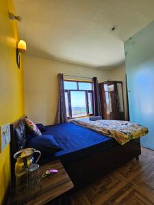 Postel nebo postele na pokoji v ubytování Dadi Homestay 360 Mountain View