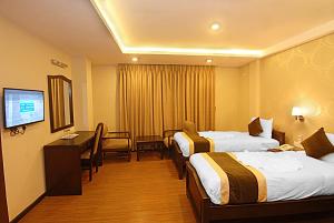 Voodi või voodid majutusasutuse Kathmandu Grand Hotel toas