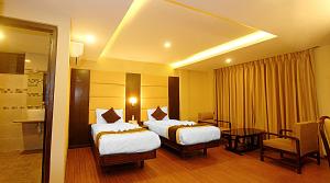 Postel nebo postele na pokoji v ubytování Kathmandu Grand Hotel + 37 fotografií