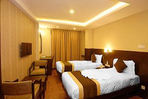 Voodi või voodid majutusasutuse Kathmandu Grand Hotel toas