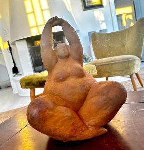 a statue of a person sitting on a table at Casal Santa Virginia in Sintra