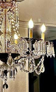 a silver chandelier hanging from a ceiling at Casal Santa Virginia in Sintra
