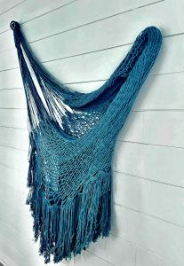 a blue bag hanging on the side of a wall at Casal Santa Virginia in Sintra