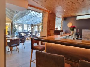 Posezení v ubytování Hotel Alpina
