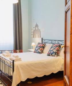 A bed or beds in a room at Affittacamere Firenze in Libertà Parterre