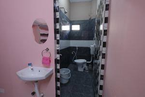 Ένα μπάνιο στο Devas Home Stay