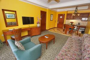 a living room with a couch and a table at Hotel Elizabeth - Baguio in Baguio