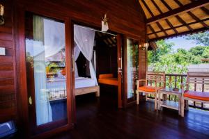 Ein Balkon oder eine Terrasse in der Unterkunft Dinatah Lembongan Villas
