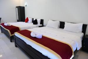Postel nebo postele na pokoji v ubytování Appu Resorts