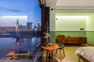 Ruang duduk di 重庆暖余江景民宿 Chongqing Nuanyu River View Hotel