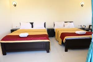 Postel nebo postele na pokoji v ubytování Appu Resorts