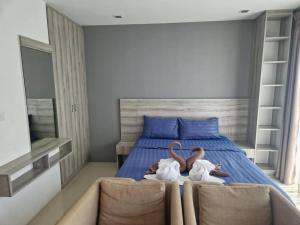 Postel nebo postele na pokoji v ubytování Grandblue condominium 602 + 18 fotografií