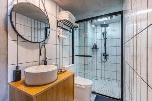 Bilik mandi di 重庆暖余江景民宿 Chongqing Nuanyu River View Hotel
