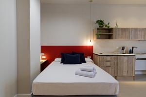 Postel nebo postele na pokoji v ubytování Osito Hub - Colomer