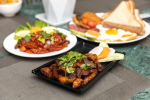 Eten bij of ergens in de buurt van het hotel

